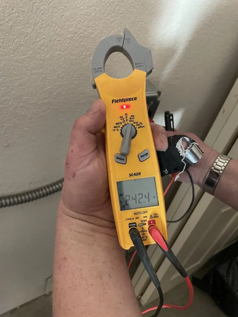 Voltage testing with clamp meter during Generator Installation in Matteson